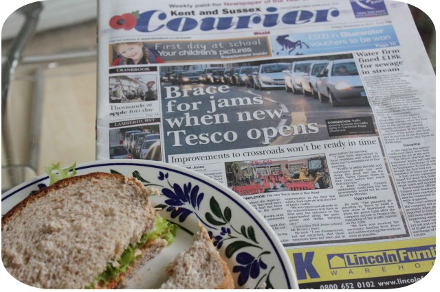 Crab sandwich and newspaper