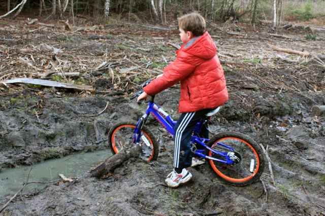 boy in muddy water