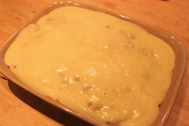 white sauce added to dish