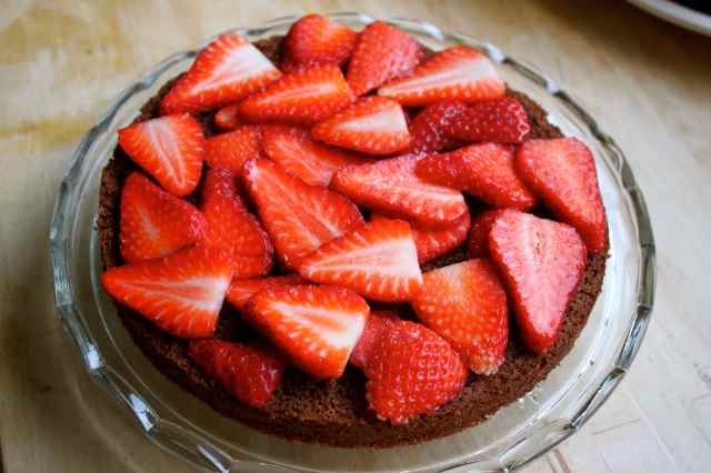 Strawberries on chocolate cake