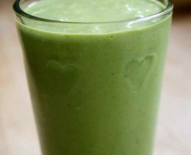 Green smoothie in heart glass