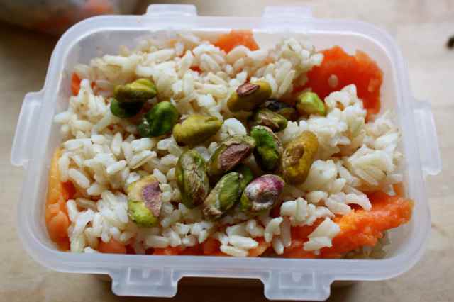 Papaya, brown rice and pistachios