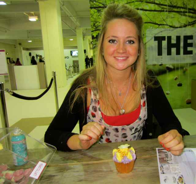 decorating a cupcake