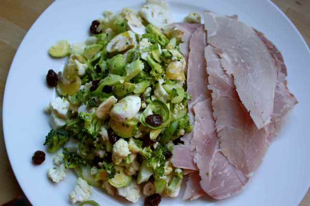 White and green salad with ham