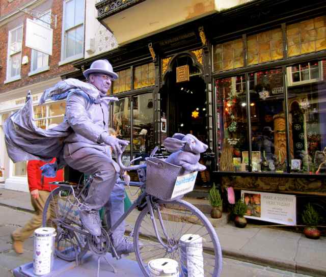 purple person on purple bike