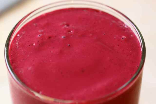 raspberry red smoothie close up