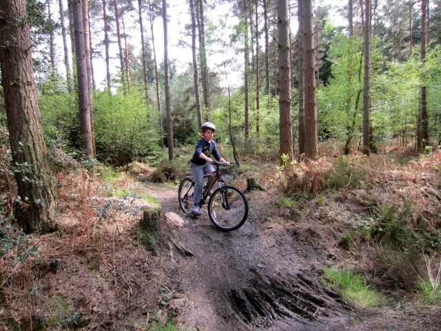 Harvey on hill on bike