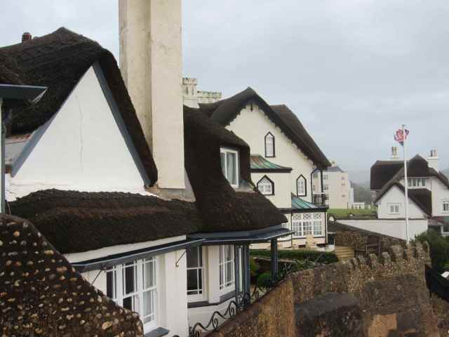 flint walls and thatched rooves