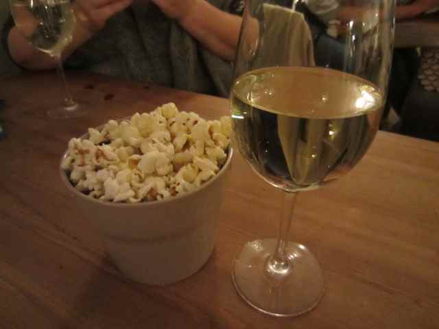 white wine and popcorn