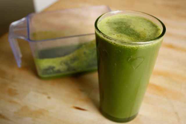 green juice in heart glass