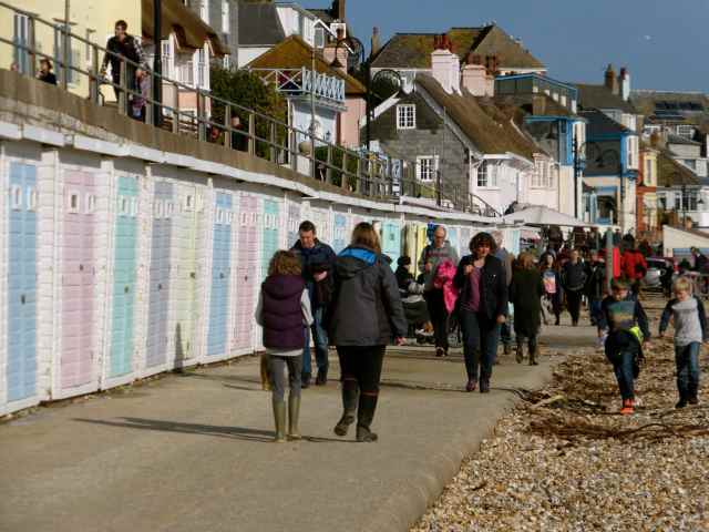 L and O walking along beach