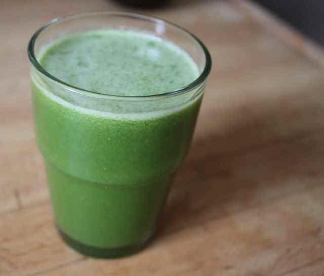 small glass of green juice