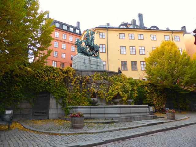statue and fountain in Gamla Stan